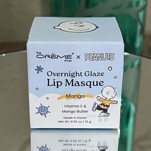 the CRÈME Shop x PEANUTS Mango Overnight Glaze Lip Masque